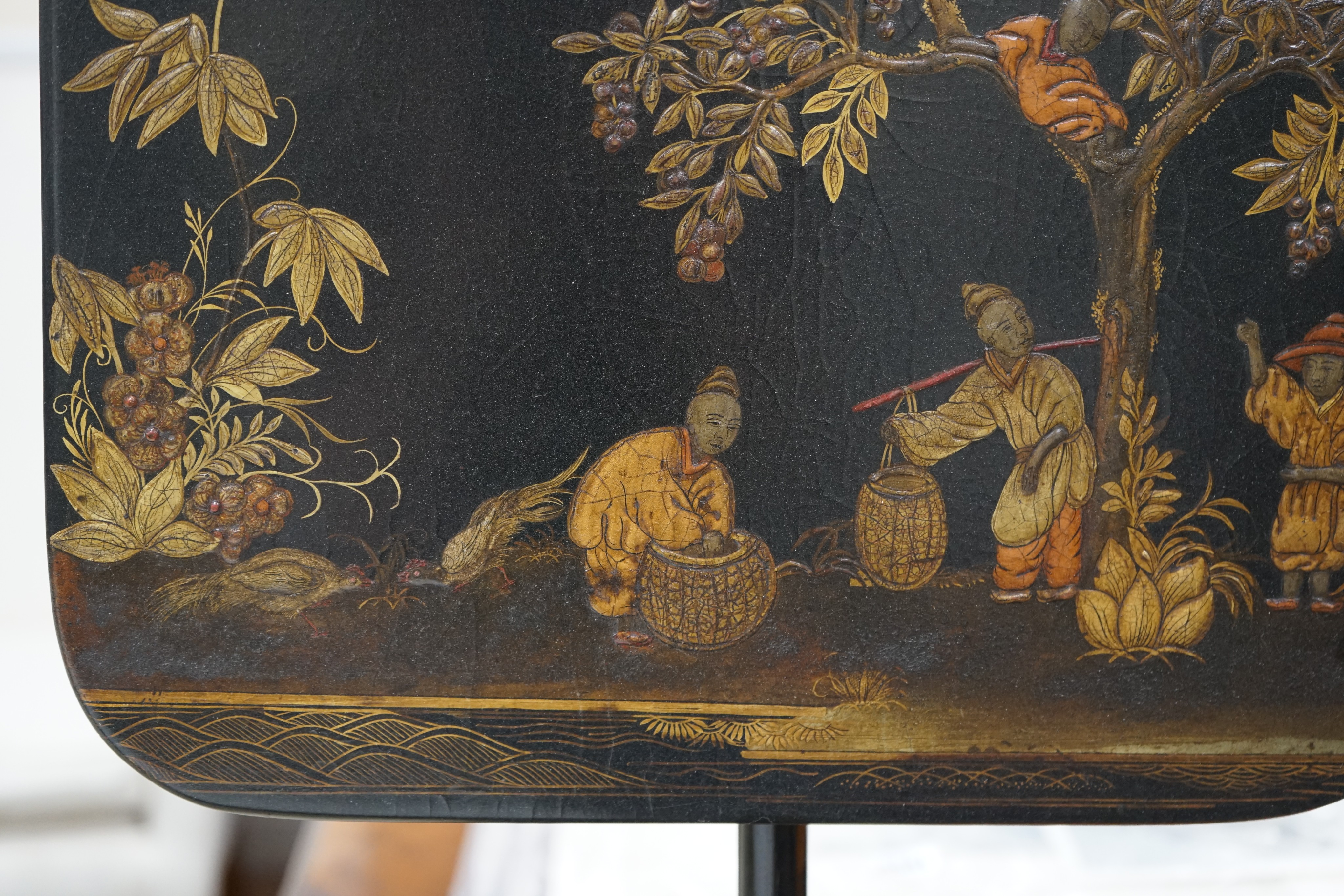 A pair of 19th century chinoiserie lacquer pole screens, height 152cm